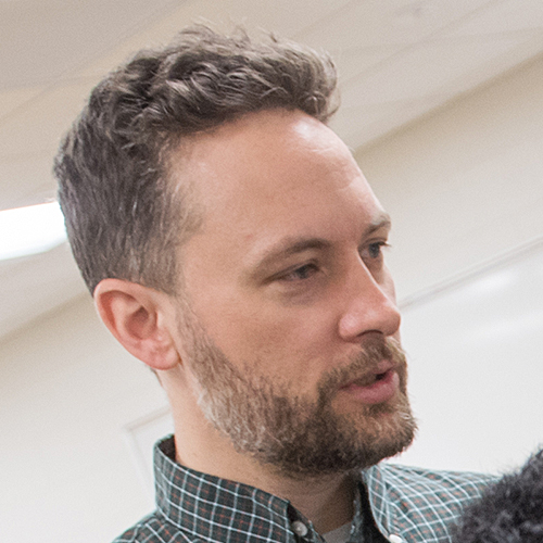 This image has an empty alt attribute; its file name is john-rieffel-profile-large.jpg